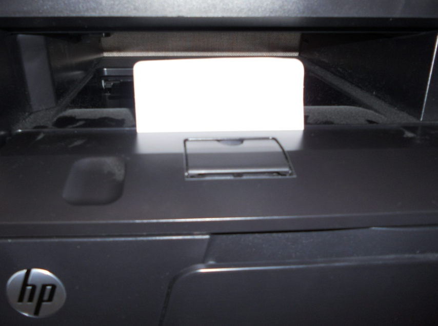 Ensure all packaging is removed from the printer to avoid "Jam in Cartridge Area" errors.